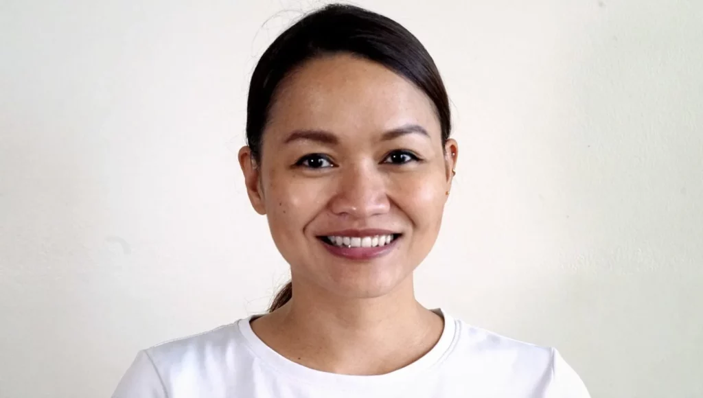 Portrait of Alyx Arumpac, a documentary filmmaker.